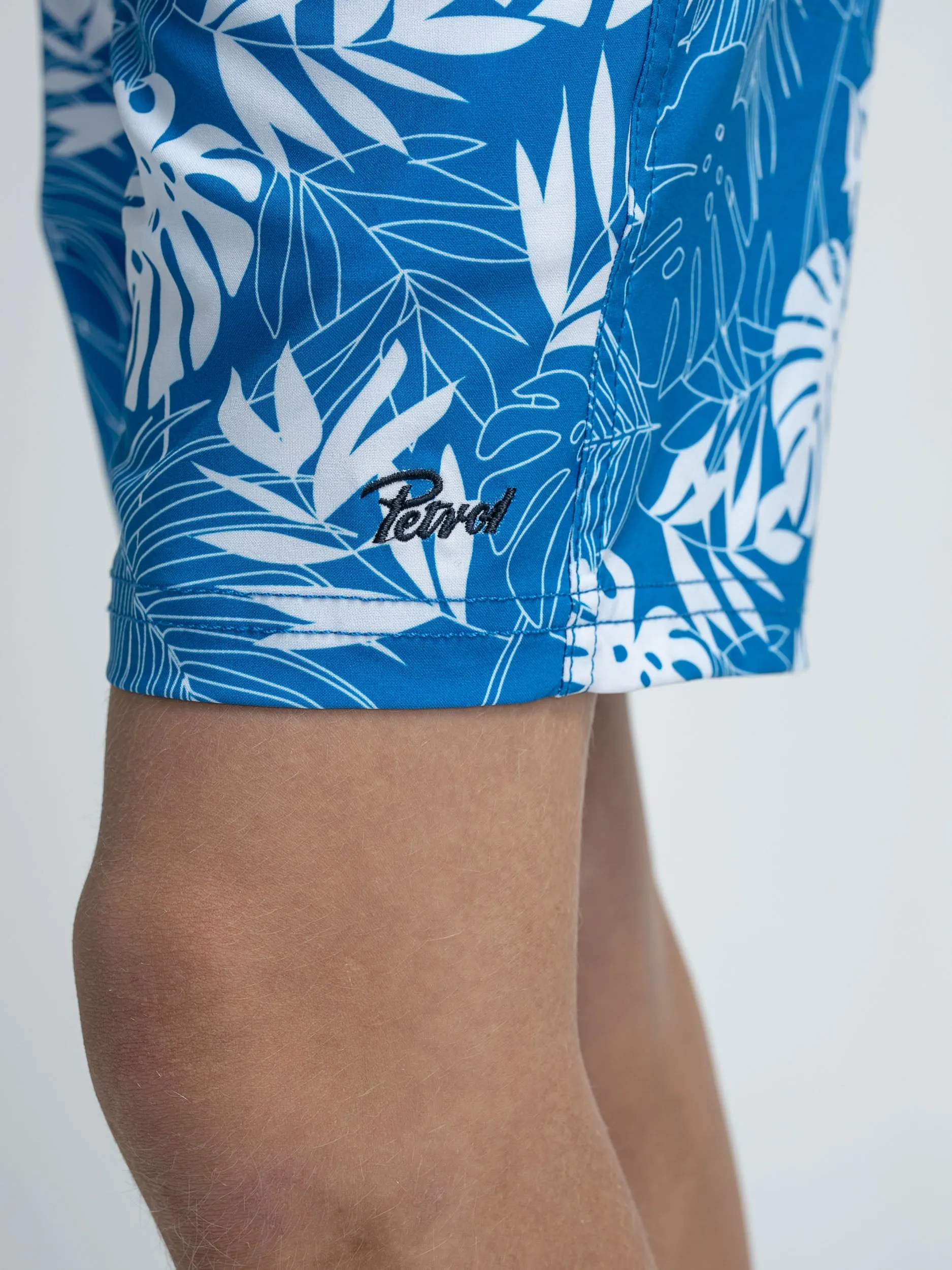 Botanical-print swimming shorts
