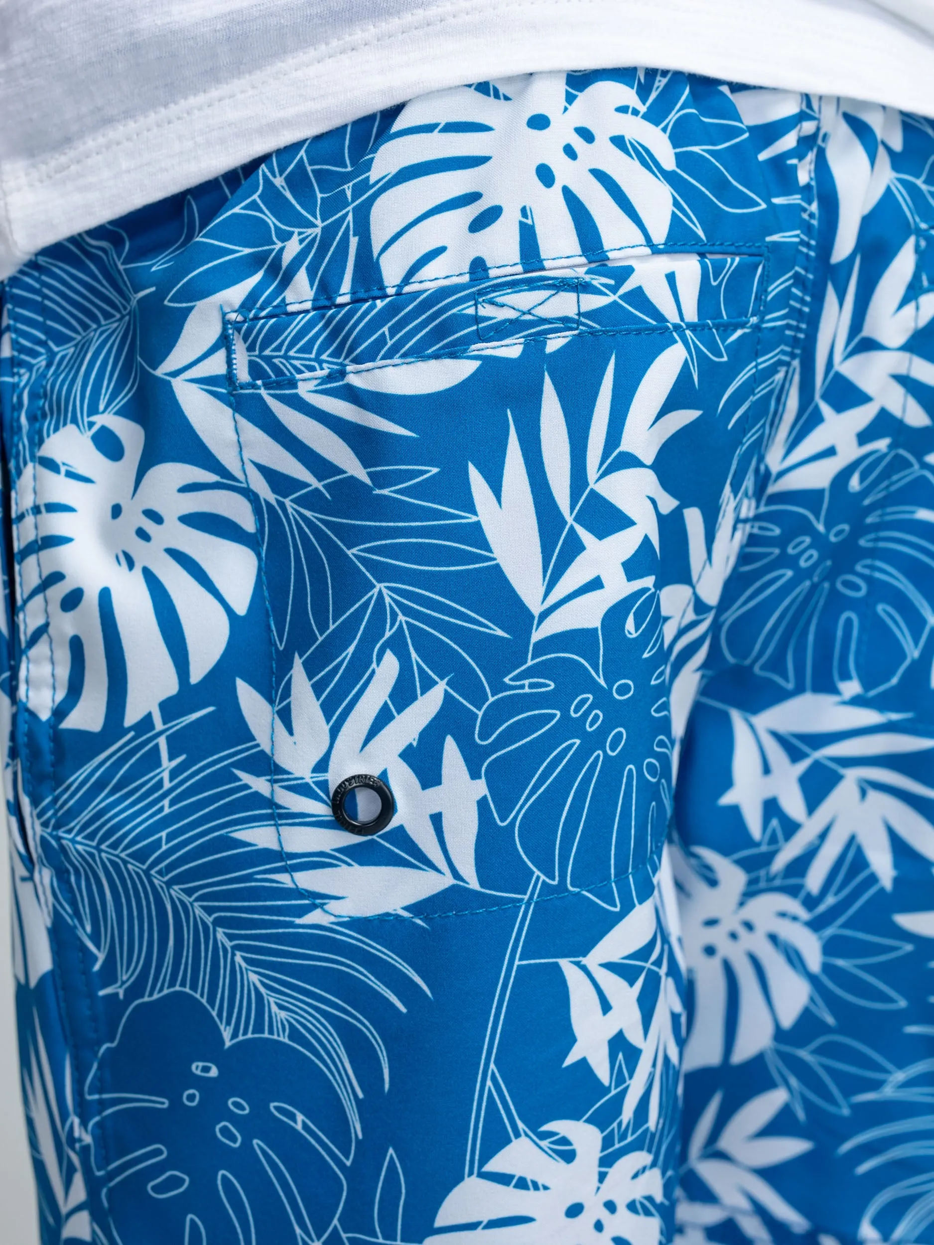 Botanical-print swimming shorts