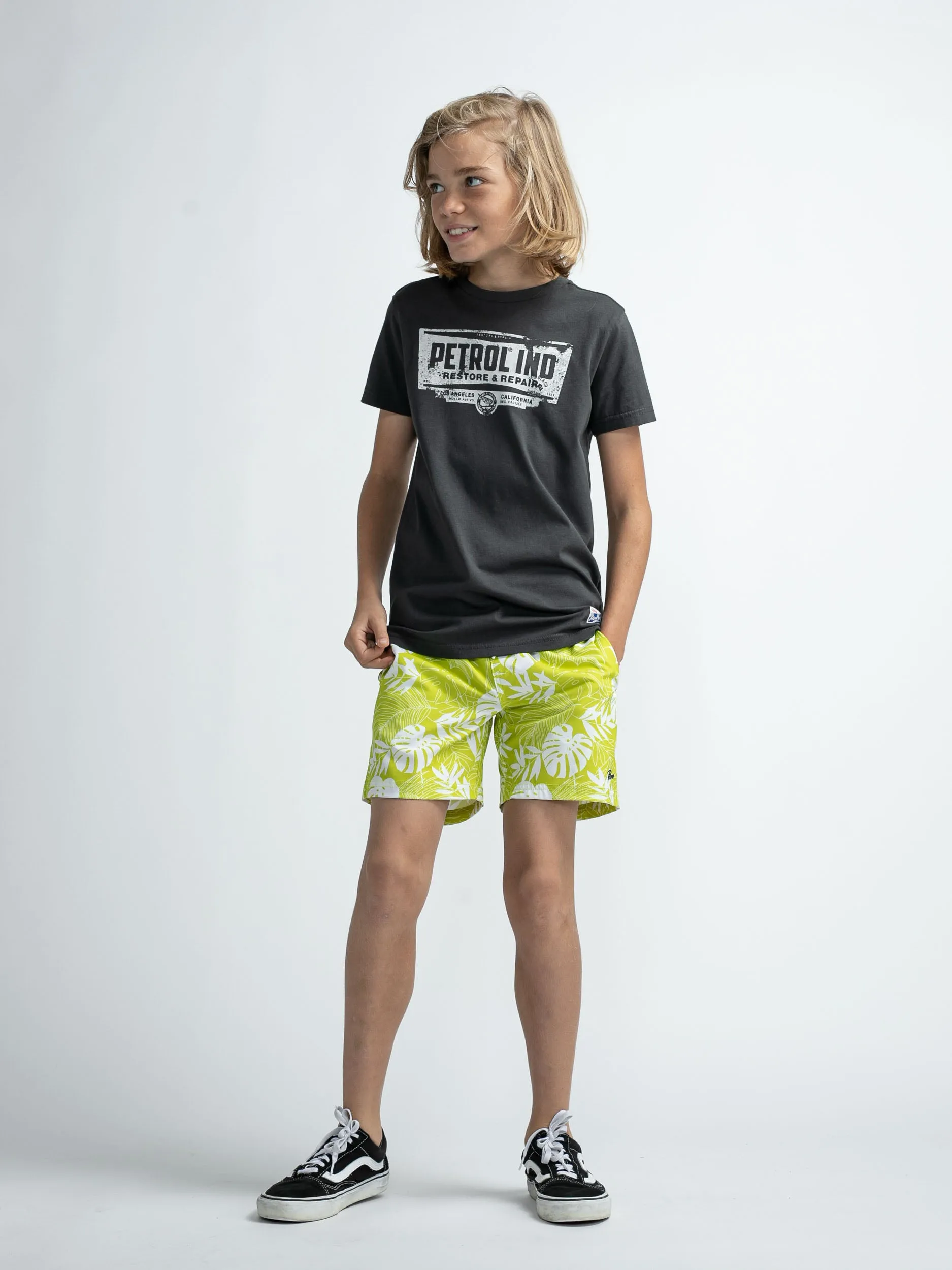 Botanical-print swimming shorts